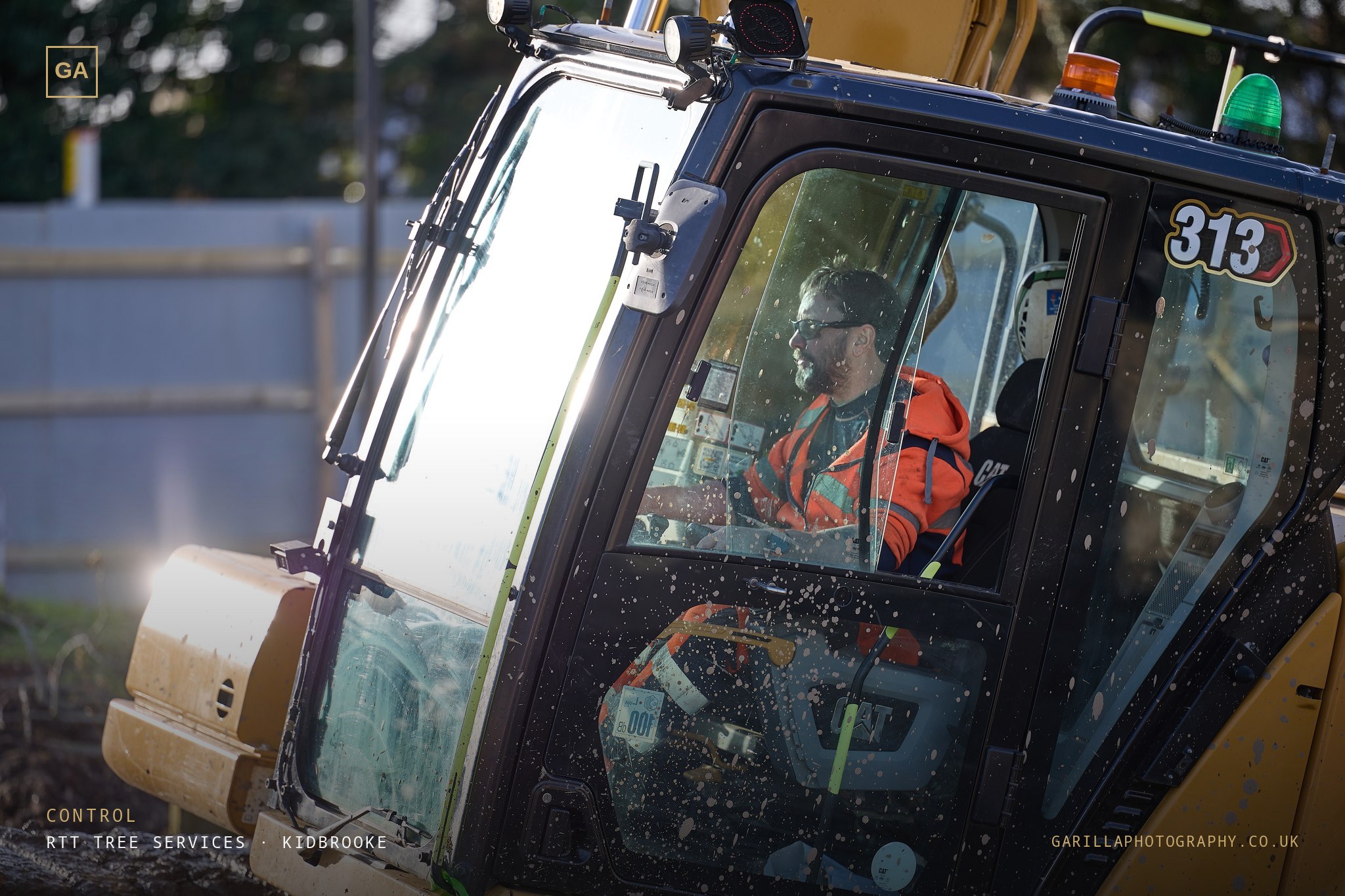Excavator operator at the controls — Control